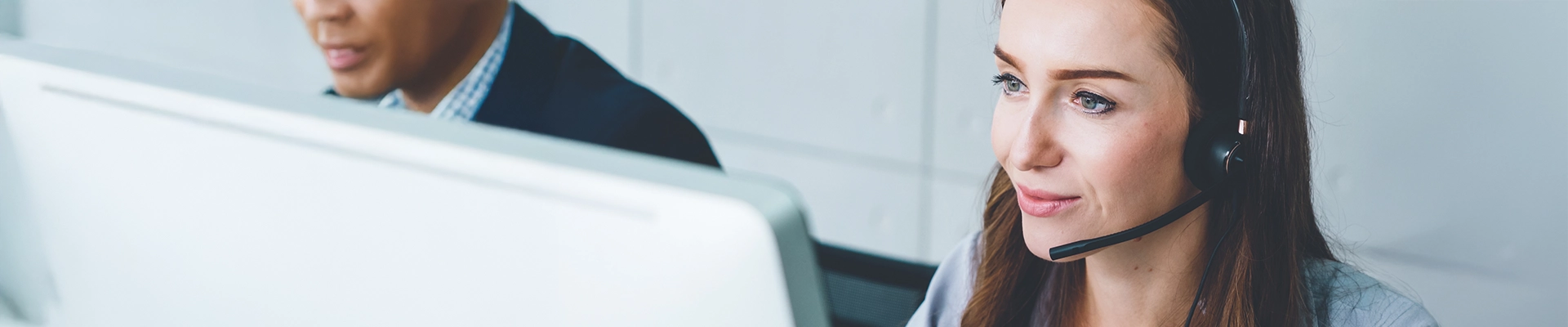 Image of customer service representative answering a phone call