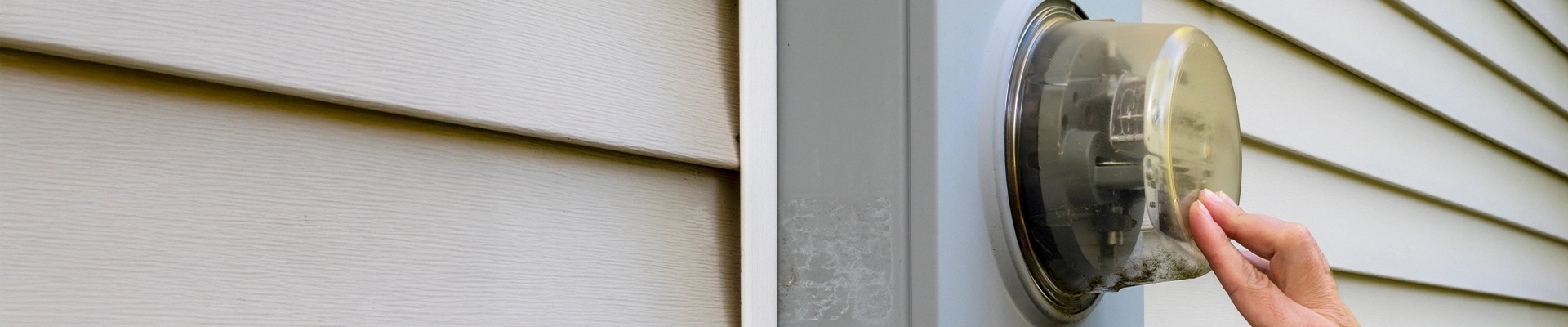A photo of an electric meter on the side of a home in Clarksville TN