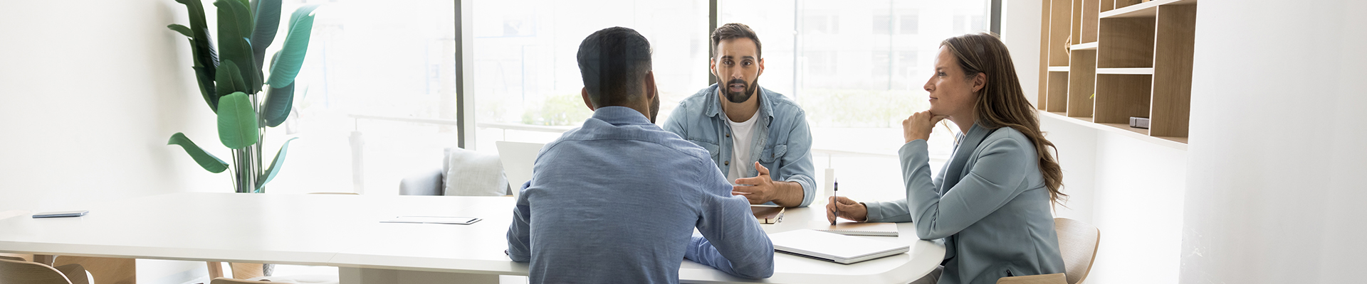 Image of business owner meeting with new clients
