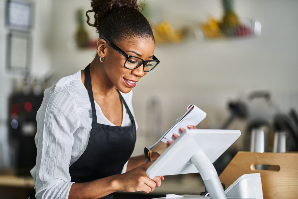 Woman using POS network on separate network system