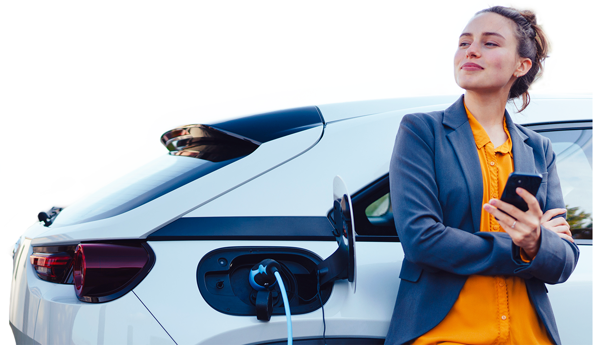 Image of women charging electric vehicl